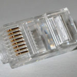 An 8P8C connector, commonly (and incorrectly) referred to as "RJ45". The standard twisted-pair ethernet connector for the last quarter century. 